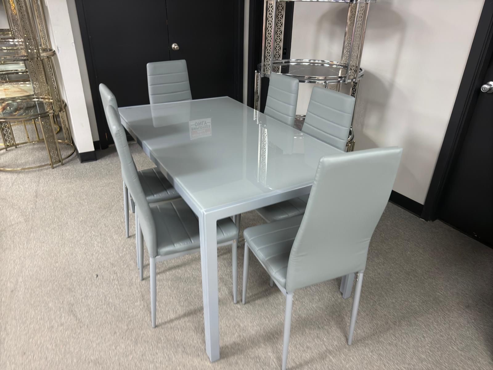 Grey glass-top dining table with 6 chairs, alternate view
