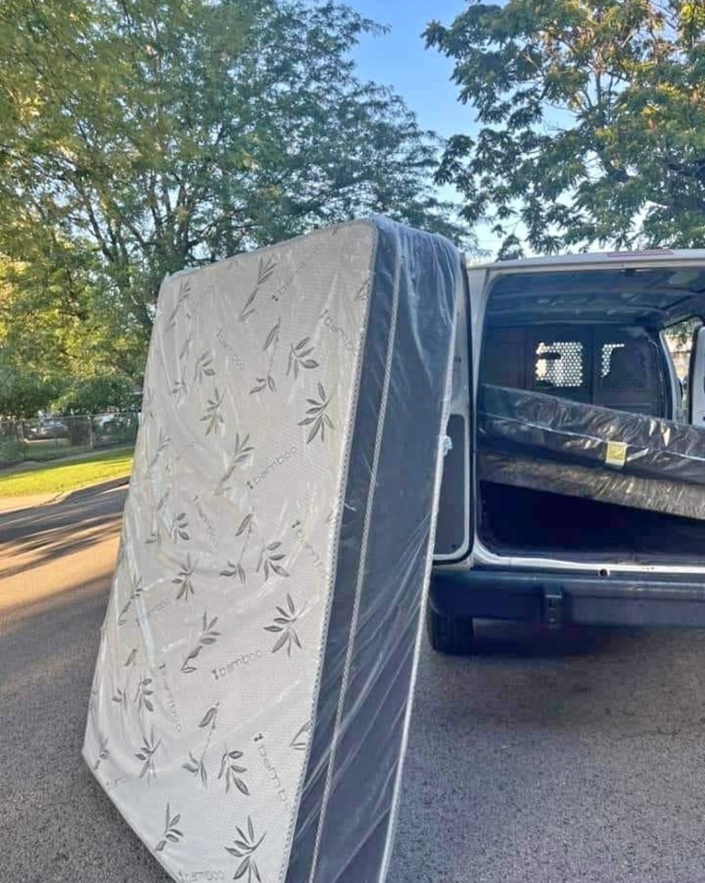Mattress being loaded for same-day delivery