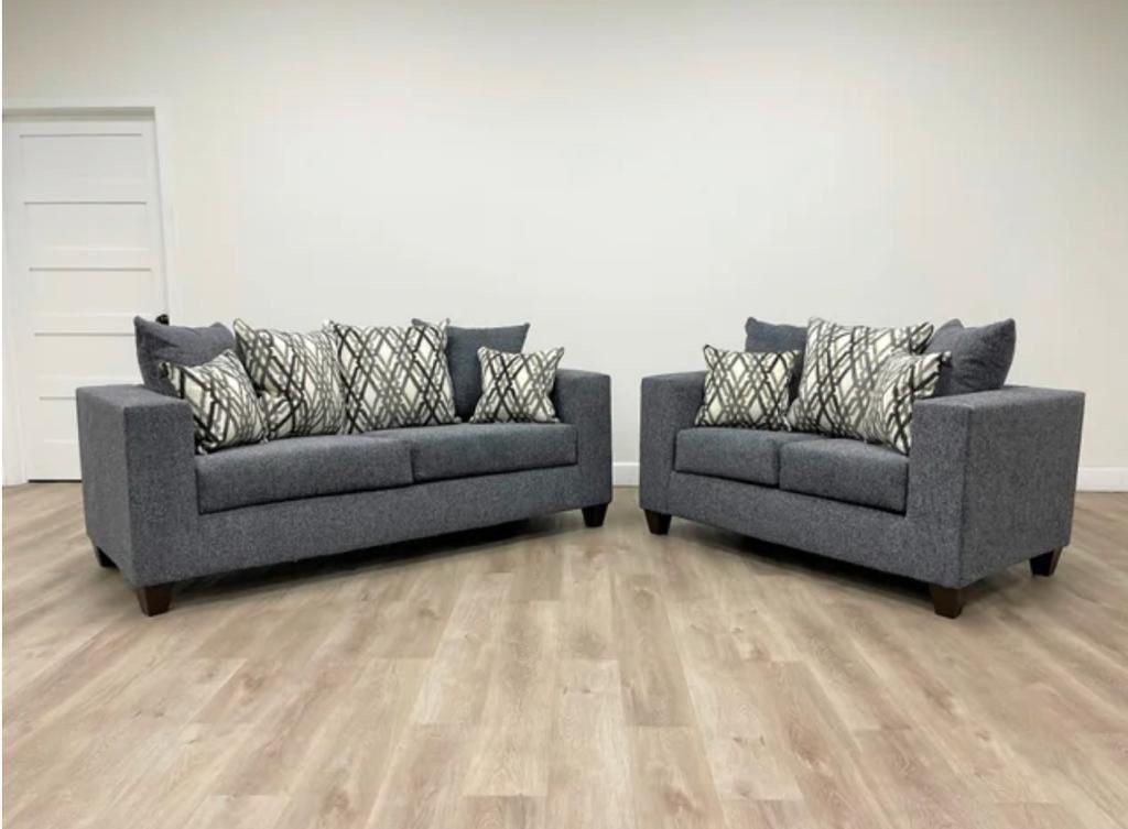 Denim grey sofa and loveseat set with diamond pattern pillows