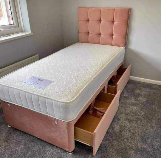 Pink velvet twin bed with storage drawers